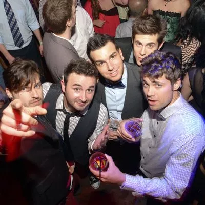 Group of guys at a bar celebrating the groom to be.